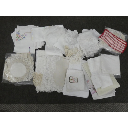 144 - A box of assorted vintage lace linen, placemats etc.