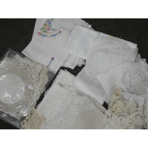 144 - A box of assorted vintage lace linen, placemats etc.