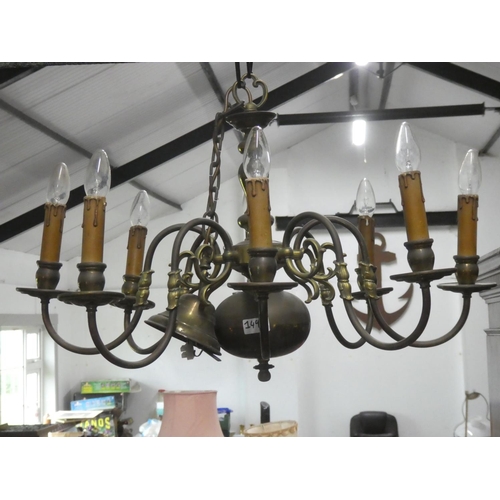 149 - A large stunning heavy eight branch centre light fitting with candle style holders.