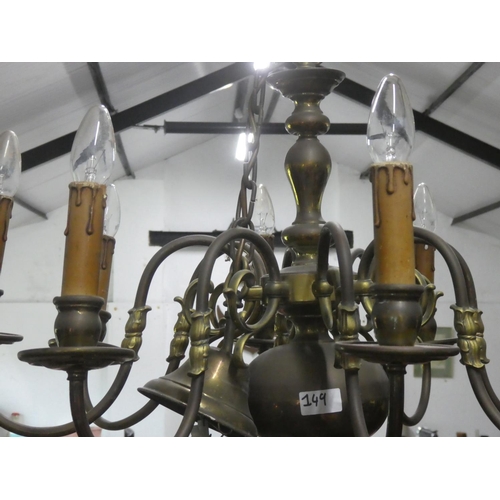 149 - A large stunning heavy eight branch centre light fitting with candle style holders.