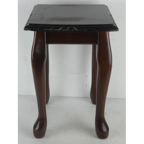 157 - A small mahogany table.