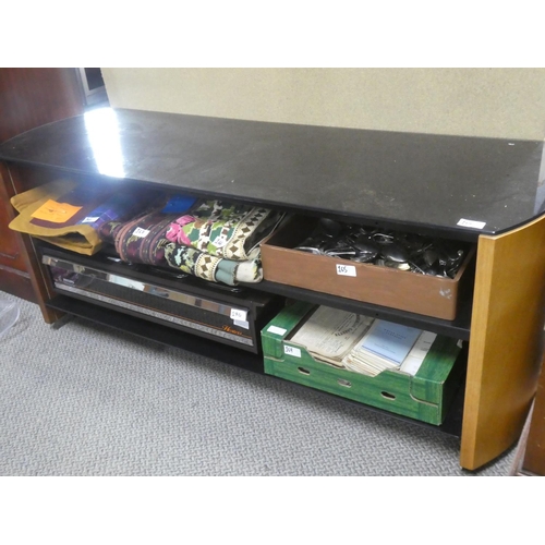 164 - A large glass topped coffee table with two shelves.