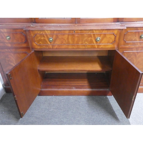 171 - A stunning mahogany four door bookcase with astral glazed door panels.