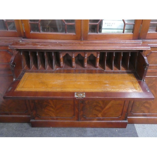 171 - A stunning mahogany four door bookcase with astral glazed door panels.