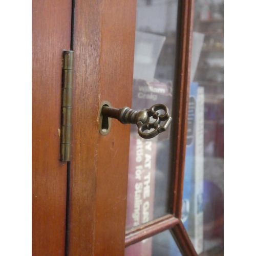 171 - A stunning mahogany four door bookcase with astral glazed door panels.