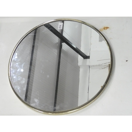 128 - A circular wall mirror with metal frame, measuring 50cm.