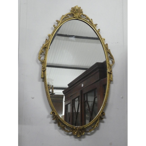 219 - A stunning gilt framed wall mirror, measuring 26