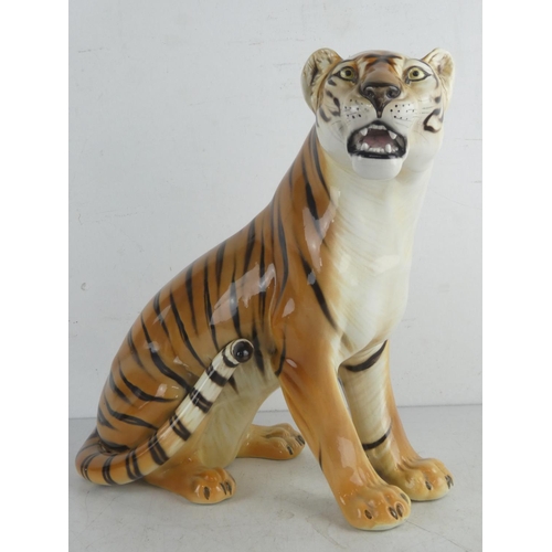 222 - A large Italian pottery ornament of a tiger, measuring 14