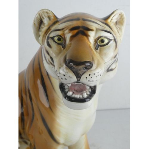 222 - A large Italian pottery ornament of a tiger, measuring 14