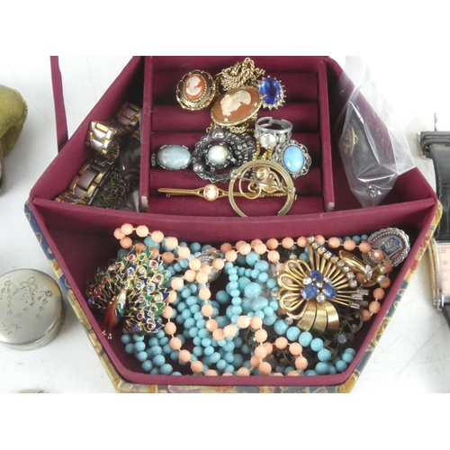 226 - A vintage jewellery box to include bangles, watches, brooches etc.