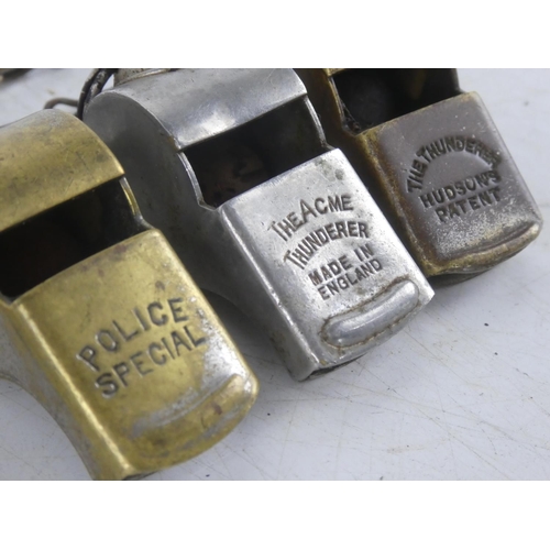 232 - Three vintage metal whistles 'Police Special', 'The ACME Thunderer' and 'This Thunderer' and another... 