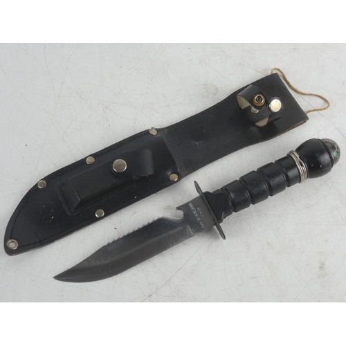 234 - A divers knife with compass handle and sheath.