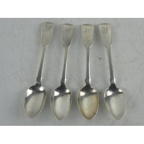 238 - A set of four antique Dublin Silver teaspoons by maker W Cummins, dated 1835.