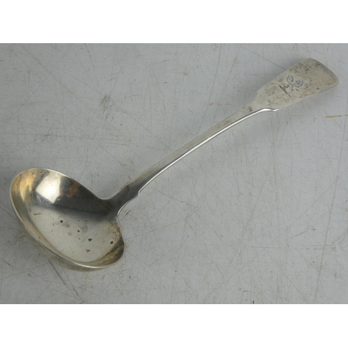 239 - An antique Dublin silver 1827 ladle by maker Samuel Neville.