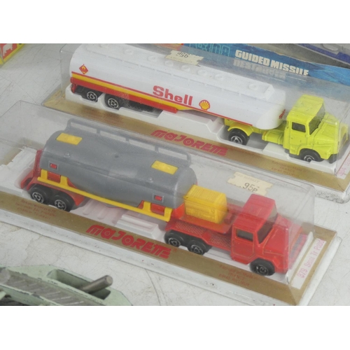 251 - Two boxed Majorette toy lorries, a vintage boxed Corgi aircraft, a vintage boxed Matchbox Seakings b... 