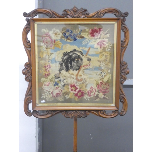 255 - A stunning antique pole screen with tapestry panel of a dog on a carved tripod base, measuring 24