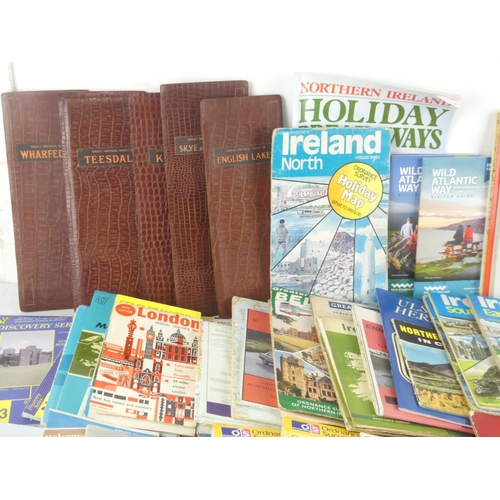 276 - A large lot of assorted road maps and guide books etc.