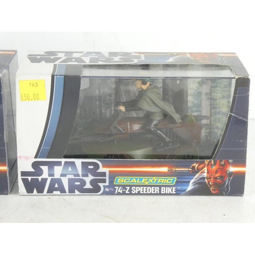 282 - Two boxed Scalextric Star Wars figures.