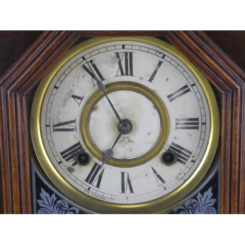 293 - A stunning Antique gingerbread clock with decorative glass panel.