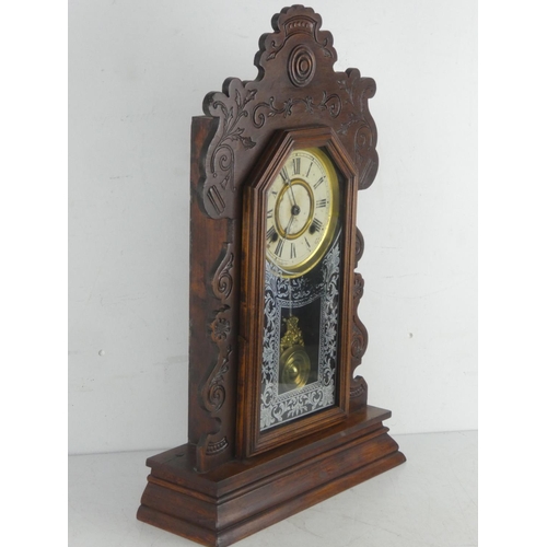 293 - A stunning Antique gingerbread clock with decorative glass panel.