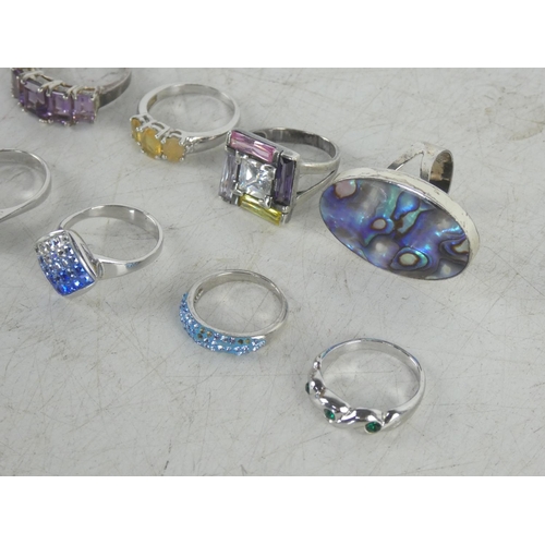 324 - Six Sterling silver dress rings and two others.