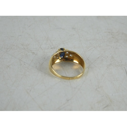 329 - A gold dress ring.