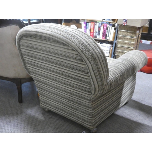 505 - A vintage overstuffed lounge chair.