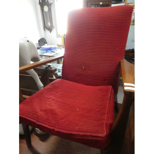 510 - A vintage Parker Knoll fireside chair.