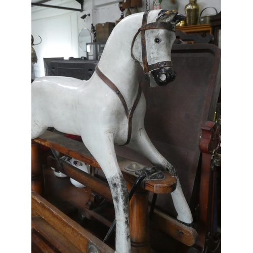 515 - A stunning vintage wooden rocking horse.