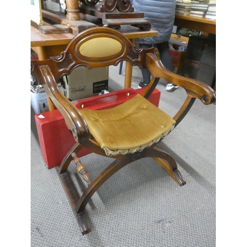 520 - An antique style Savonarola chair.