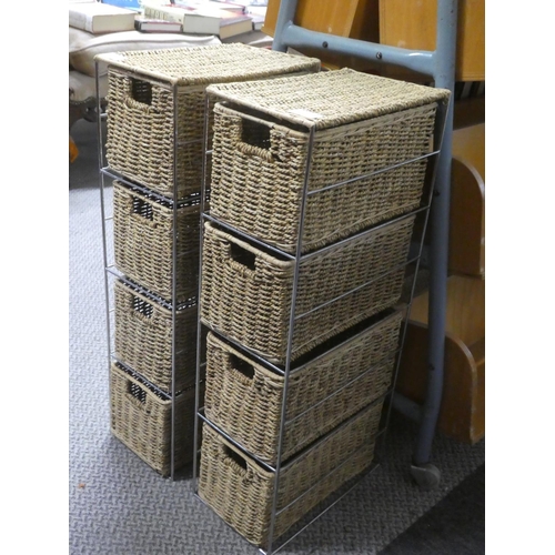 543 - A pair of rattan four drawer cabinets.