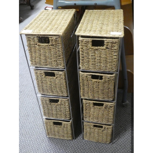 543 - A pair of rattan four drawer cabinets.