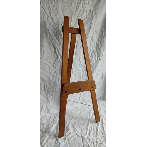 422 - A vintage wooden easel.