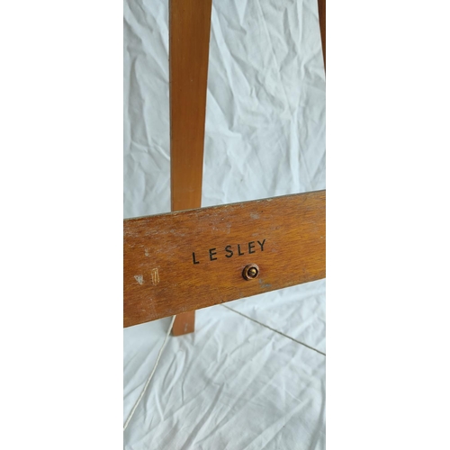 422 - A vintage wooden easel.