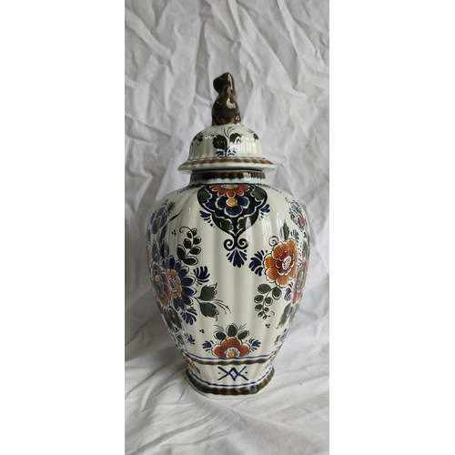 426 - A Danish Delft Polychroom Holland lidded pottery vase.