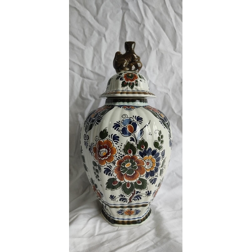 426 - A Danish Delft Polychroom Holland lidded pottery vase.