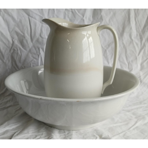 428 - A Gibson pottery jug and wash bowl set.