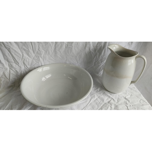 428 - A Gibson pottery jug and wash bowl set.