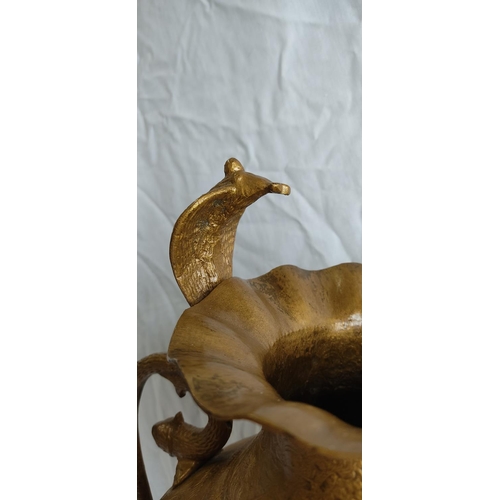 429 - A large Indian brass vase with Cobra snake and fish style handles.