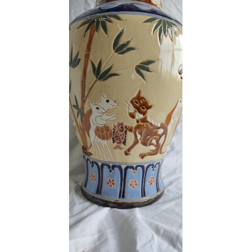 431 - A stunning large glazed vase with cat and mice decoration with repair.