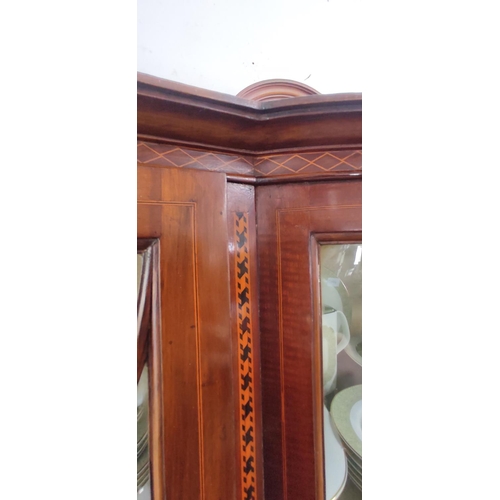 432 - A stunning antique mahogany and inlay bow fronted china cabinet.