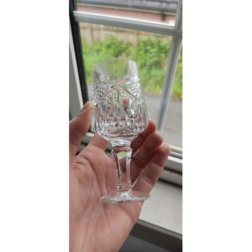 439 - A set of 5 crystal sherry glasses, a set of 6 small crystal wine glasses and 6 crystal hock glasses ... 