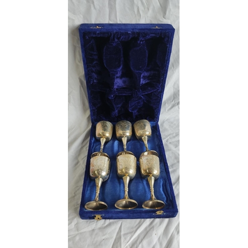 442 - A cased set of six silver plated goblets.