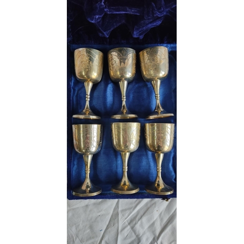 442 - A cased set of six silver plated goblets.