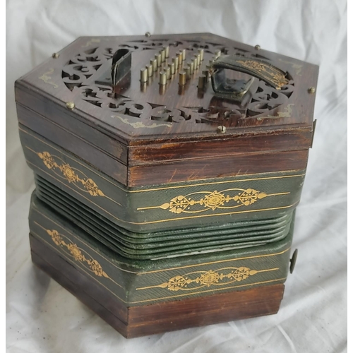 463 - A stunning antique oak and brass detailed concertina.