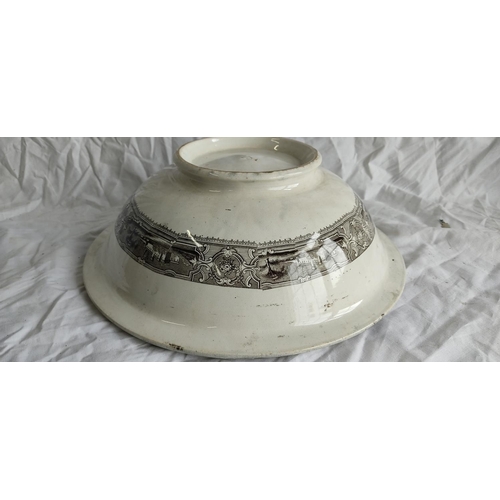 491 - An antique pottery bowl with transfer print of Wellington Arch (a/f).