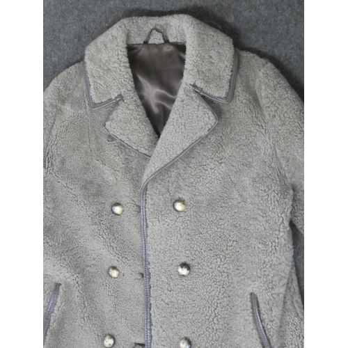 145 - A vintage Sheepskin style coat. Medium size.