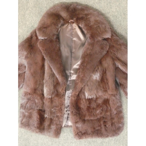 147 - A vintage fur coat.