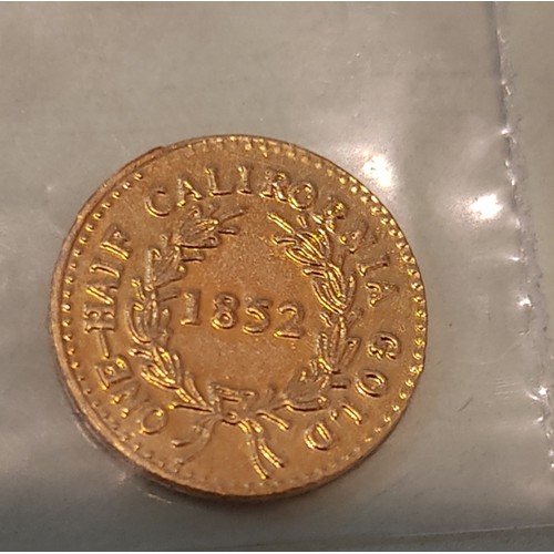 19 - An 1852 one half California gold coin, weighing 0.5grams.