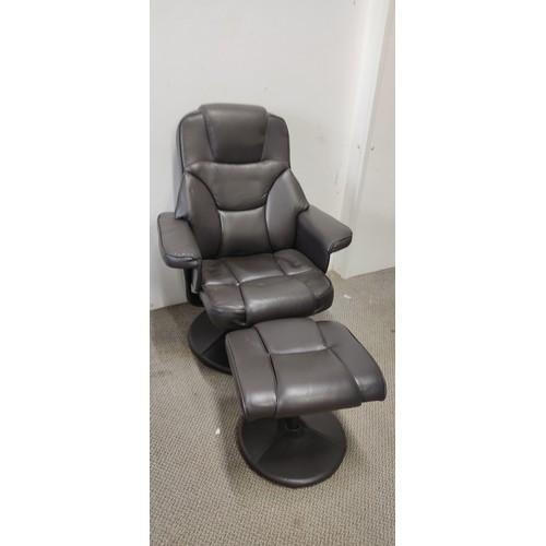 148 - A Morris Furniture group swivel chair and matching footstool.